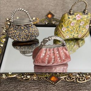 Metal and enamel trinket box purses.